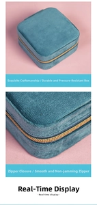 Macro detail of high-quality smooth metal zipper on blue velvet jewelry travel case