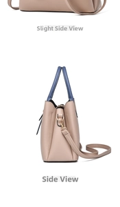 Detailed side view of lychee texture PU leather handbag with contrasting handles