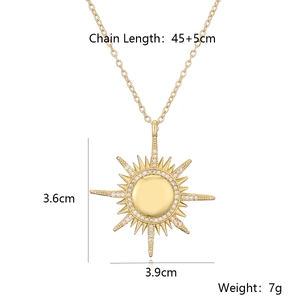Detail of gold sun pendant necklace with dimensions 3.6cm by 3.9cm and weight 7g