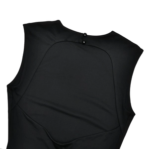 Detail showing back keyhole closure with two buttons and cut-out on black sleek dress