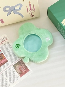 Close-up of mint green plush flower photo card holder with embroidery and window