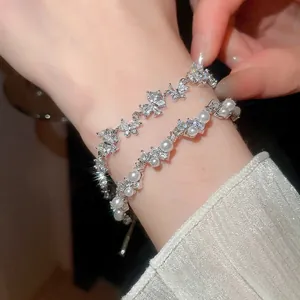 Elegant silver butterfly bracelet set with sparkling zircon and pearls for women