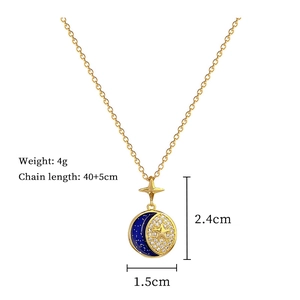 Detail showing gold moon and star pendant size 2.4x1.5cm with blue enamel and crystals