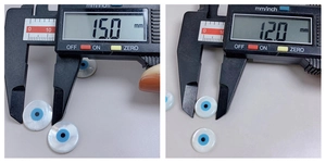 Calipers measuring 12mm and 15mm round mother of pearl shell evil eye beads for DIY