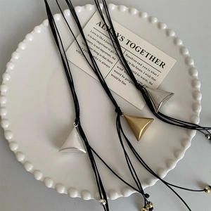 Adjustable leather cord necklace with double-layered matte gold and silver triangles