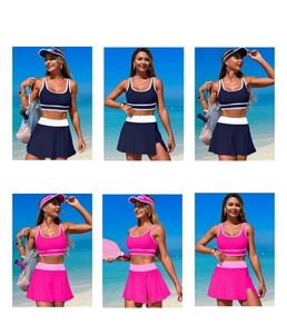 Detail of two-piece pleated sports bikini skirt set with racerback top in beach setting