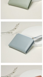 Close-up of minimalist leather wallets in pastel green, blue, and pink cross-grain textures