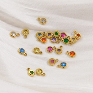 5mm gold stainless steel round pendants with colorful zircon stones on white silk
