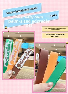Detailed close-up of silicone wrist straps with Good Luck text and candy motifs