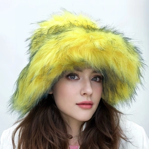 Front view of a fluffy bright yellow faux fur punk style winter hat on a model