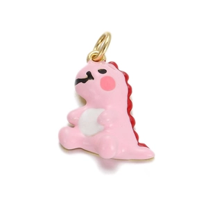Macro detail of a 18k gold-plated pink dinosaur pendant with red spine and white belly