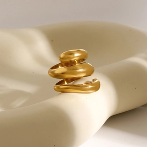 Detailed close-up of 18k gold plated stainless steel triple layer spiral spring ring