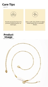 Detailed close-up of Baroque pearl necklace with gold heart shell pendant and lobster clasp