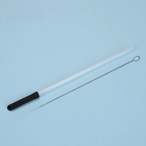 Reusable Tritan straw set with clear glass body, black silicone tip and metal cleaning brush