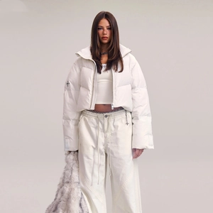 Short white puffer jacket with cross embroidery on sleeve and loose fit design