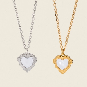 French vintage heart shell necklaces in gold and silver steel with lace relief