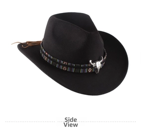 Detail of black cowboy hat with ethnic woven band, silver bull skull, and leather tassels