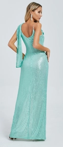 Detailed back view of mint green sequin maxi dress featuring a shoulder cape and side slit