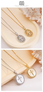 Detail of gold and silver cross pendants with mother of pearl and tree of life motifs