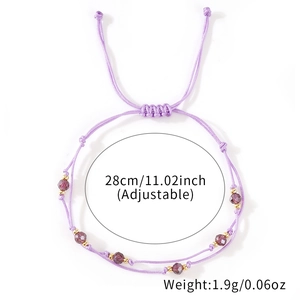Adjustable purple braided rope bracelet with crystal beads and gold spacers in minimalist style