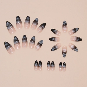 Halloween star and moon press-on nails with black gradient almond shape design