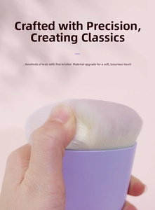 Detail shot of lavender makeup brush fibers showing soft synthetic bristles and resilience
