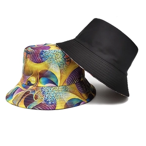 Chapeau bob réversible noir et imprimé coloré avec large bord pour protection solaire