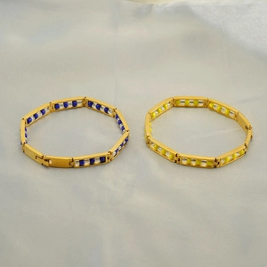 Titanium beaded chain bracelet with golden rectangular links and navy blue or yellow beads