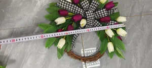 Detailed view of handmade tulip wreath with check bow and 45cm diameter measurement