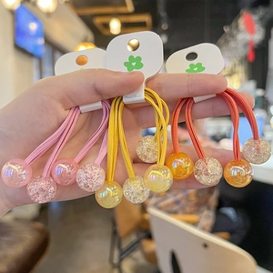 Three-piece set of candy-colored cracked ball hair ties for girls in pink yellow and orange