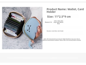 Detail view of small cat themed card wallet with accordion slots and cat tail zipper