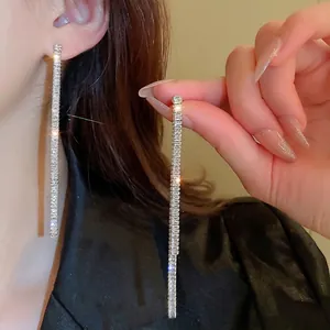 Elegant long silver tassel drop earrings with sparkling cubic zirconia for women