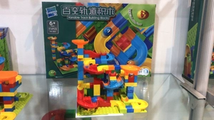 Detailed 174-piece marble run building block set with colorful chutes and funnels