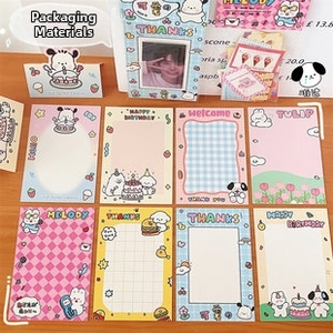 Detailed close-up of colorful cartoon greeting cards featuring cute puppy and rabbit designs