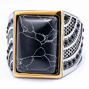 Vintage stainless steel ring for men with black stone inlay and gold-tone border