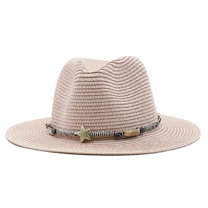 Women's straw boater hat in light beige with ethnic beaded star trim for beach sun protection