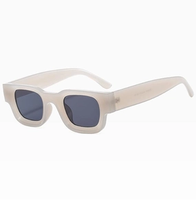 Detail view of matte translucent square sunglasses frame with dark tinted lenses
