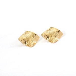 Elegant gold square stud earrings with irregular hammered texture on white background