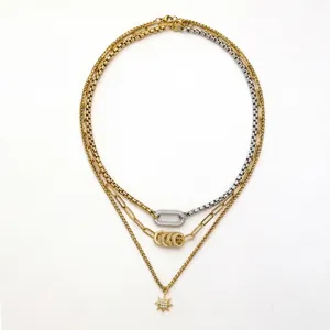 Three-layer gold and silver mixed chain necklace with crystal star and oval pendants