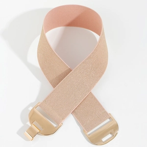Detail of pink woven elastic waist belt with a gold geometric metal buckle closure