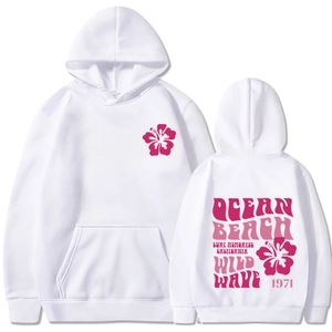 Detail of white hoodie featuring pink hibiscus print and retro Ocean Beach back graphic