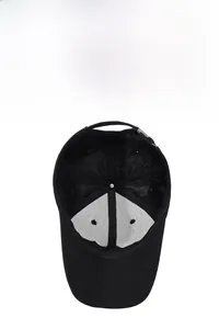 Detail view of the breathable mesh lining and adjustable metal buckle on black baseball cap