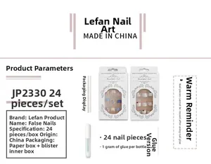 Detailed set of 24 beige and light blue marble press-on nails with 1g glue packaging