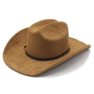 Detail of classic brown faux suede cowboy hat with curved brim and black belt band decoration