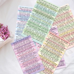 Macro shot of Small Talk vintage quote stickers with colorful stripes for DIY scrapbooking