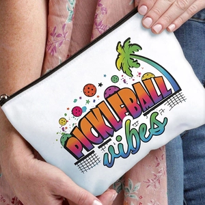 White canvas pickleball vibes makeup bag with colorful prints and zipper closure