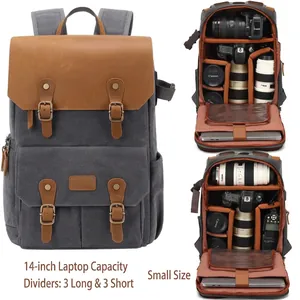 Waterproof canvas camera backpack with leather straps and 14 inch laptop compartment
