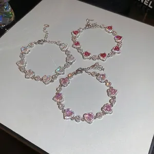 Luxury heart-shaped zircon bracelets set in silver, pink, and red with crystal halos