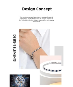 Detailed macro view of tennis bracelet featuring blue and white round cut zircons