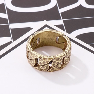 Retro golden 316L stainless steel ring with hammered texture shown at a 45-degree angle